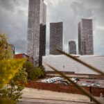 a view of a city with tall buildings